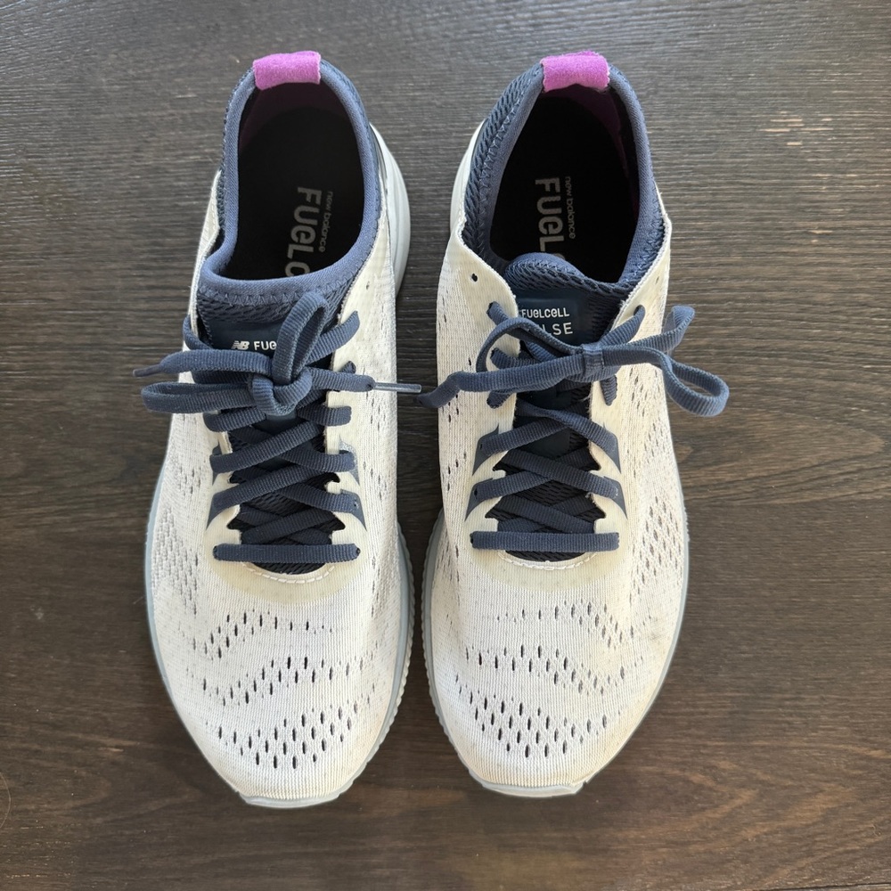 New Balance Women’s Fuel Cell trainer.  These are extremely lightweight. Size 10
